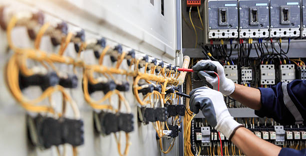Professional Electrician technician working in Harlan, IA